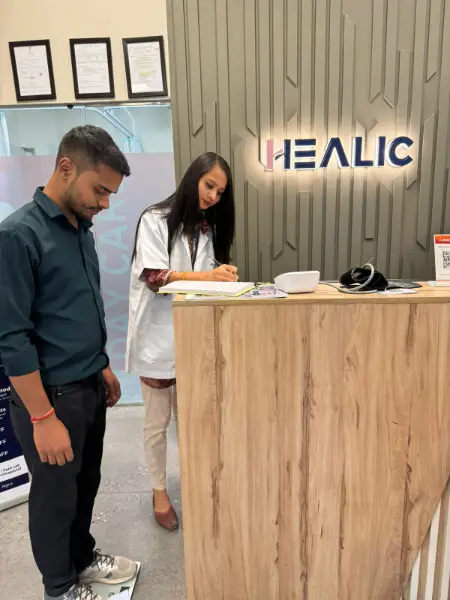 Healic Clinic Staff - measuring patient weight 3